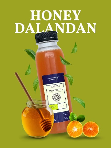 Karma Kombucha Honey Dalandan bottle with fruit